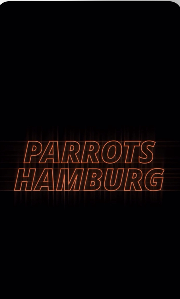 Orange Schrift auf schwarzem Hintergrund: Parrots Hamburg